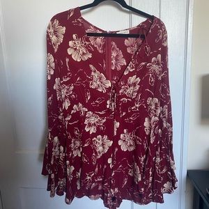 Red floral romper with bell sleeves